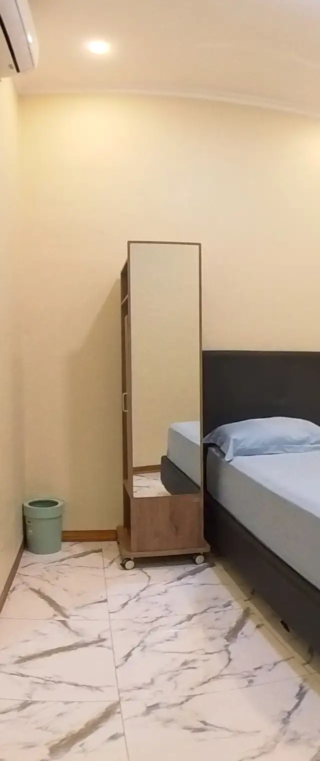 Foto Deluxe di Pomah Guesthouse Semarang